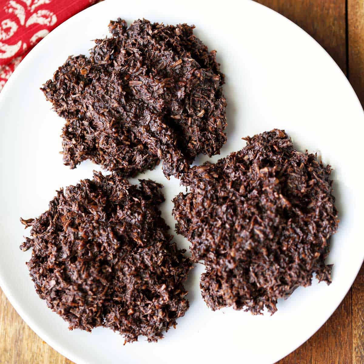 Coconut haystacks are served on a white plate.