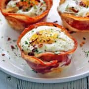 Bacon egg cups are served on a white plate.
