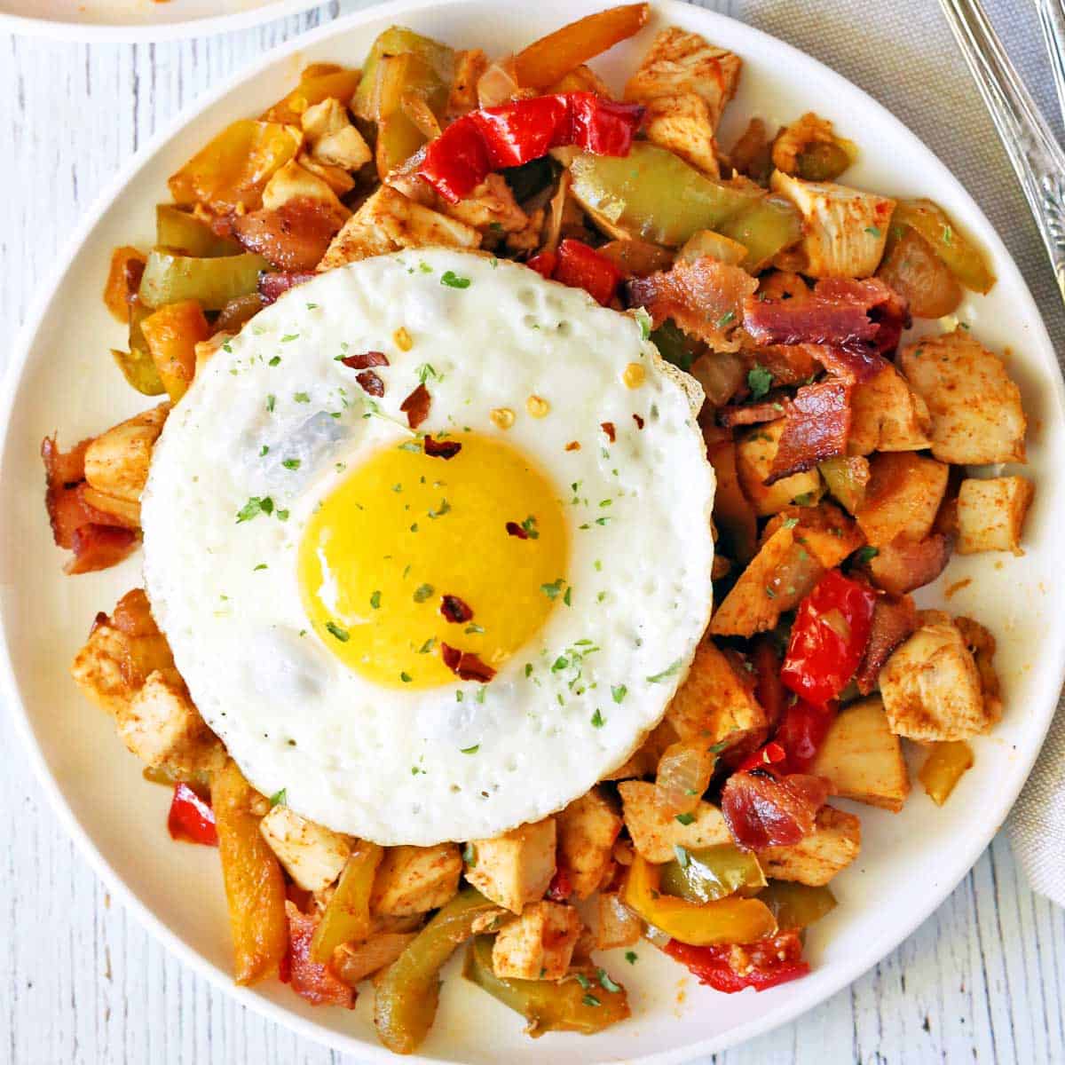 Turkey hash is topped with a fried egg.