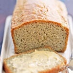 Almond flour bread is served on a white serving tray.