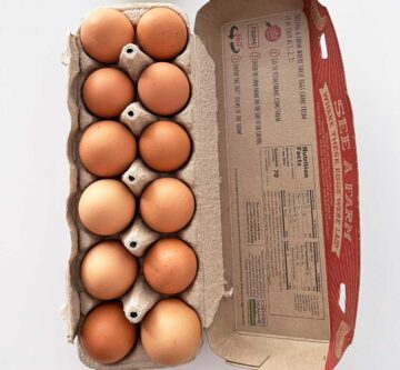 A carton of eggs on the counter.
