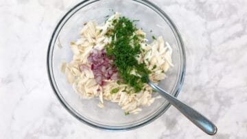 Crab salad ingredients in a bowl.