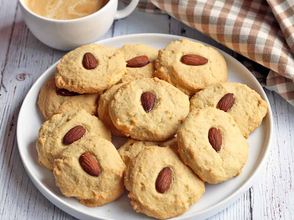 Almond flour cookies are served with coffee.
