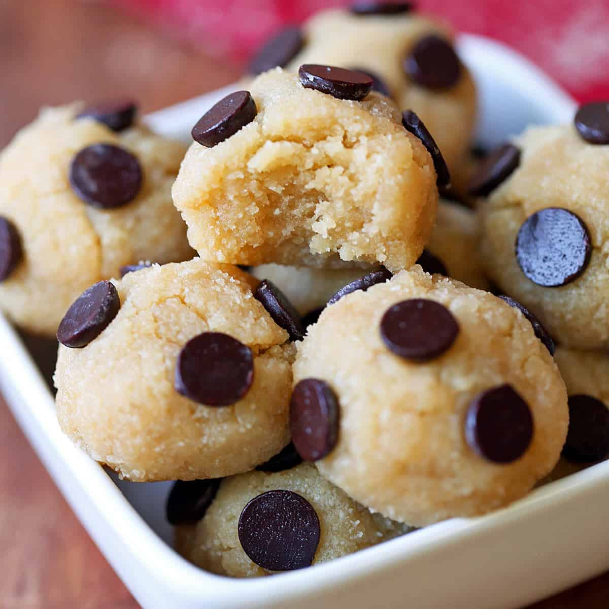 Keto cookie dough is served in a white bowl.