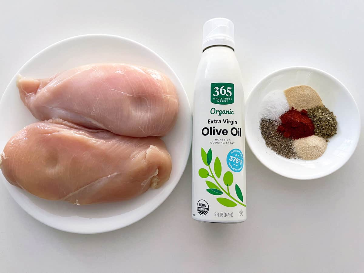The ingredients needed to bake a chicken breast.