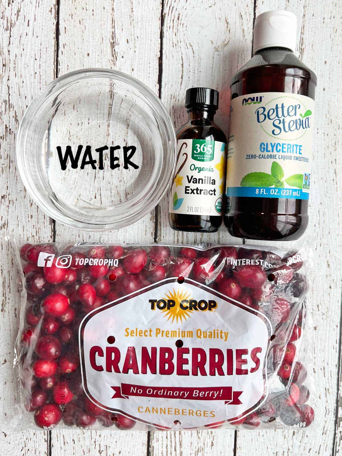 The ingredients needed to make a keto cranberry sauce.