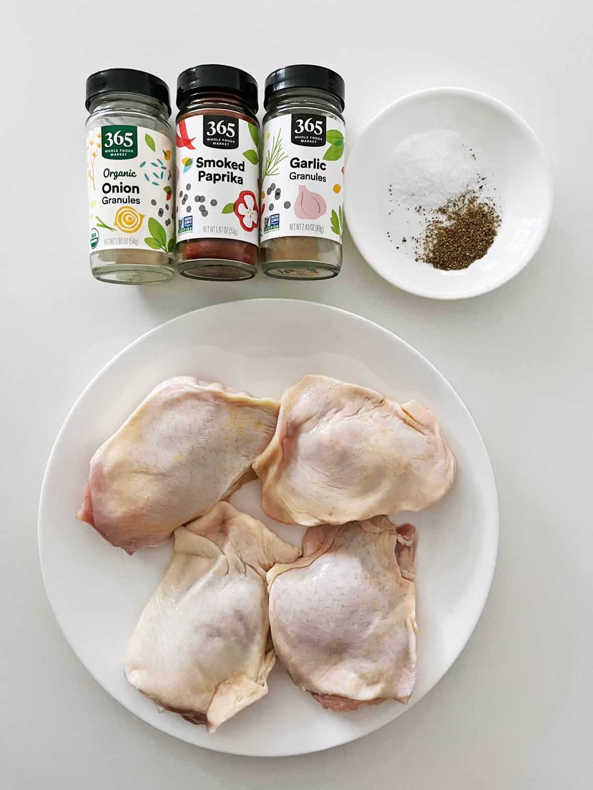 The ingredients needed to make crispy chicken thighs.