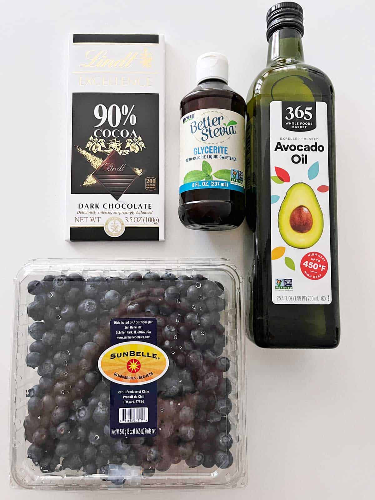 The ingredients needed to make chocolate-covered blueberries.