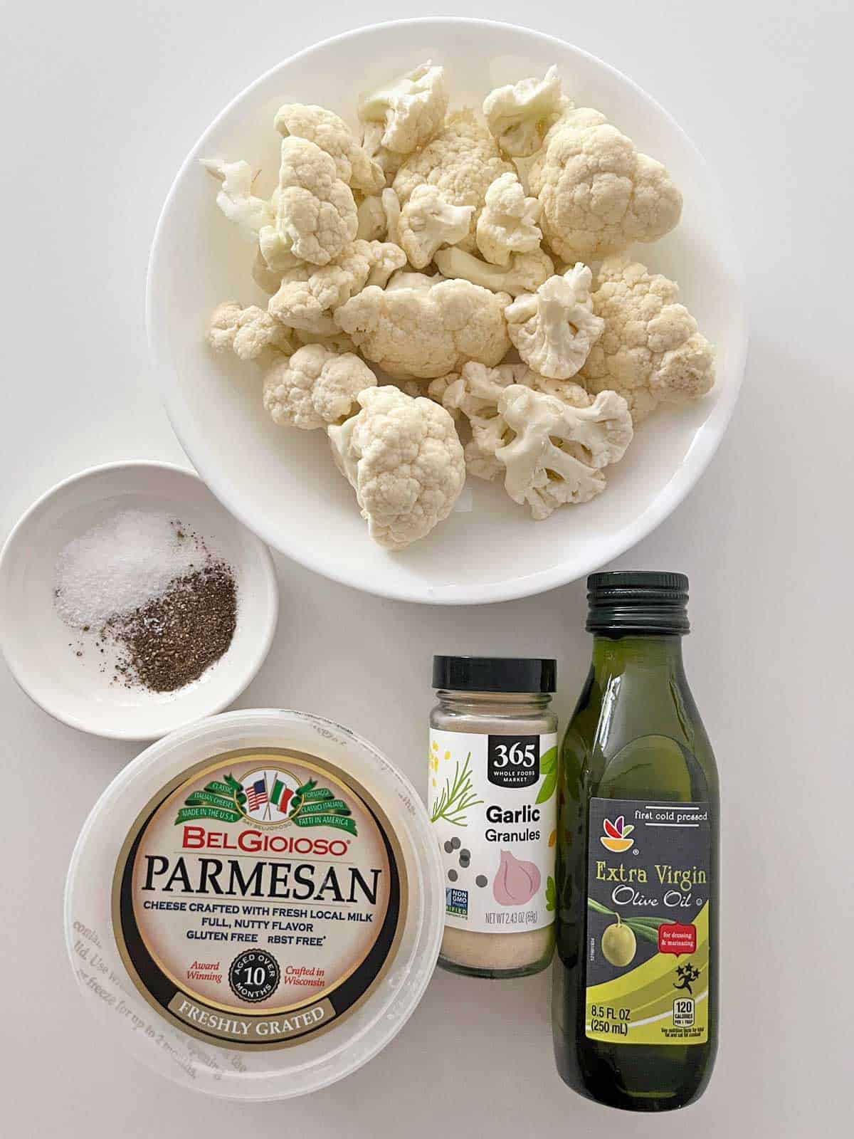 The ingredients needed to make roasted cauliflower.