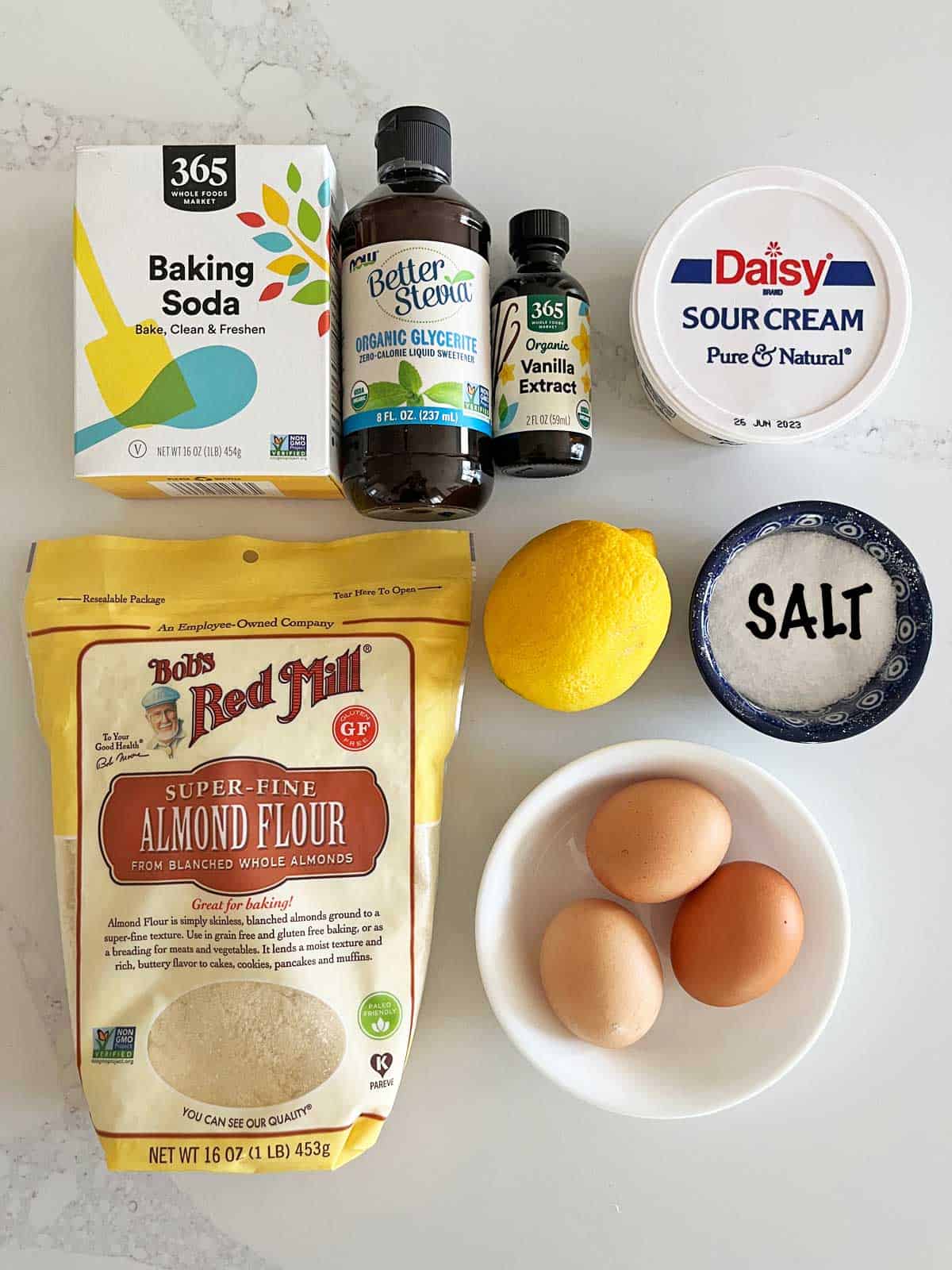 The ingredients needed for making almond flour muffins.