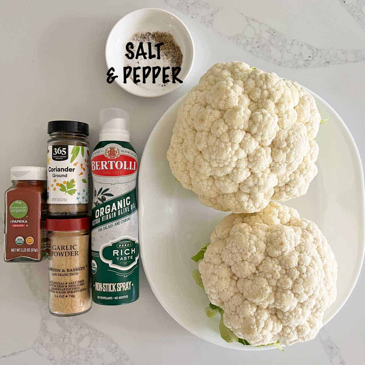 The ingredients needed to make cauliflower steak.