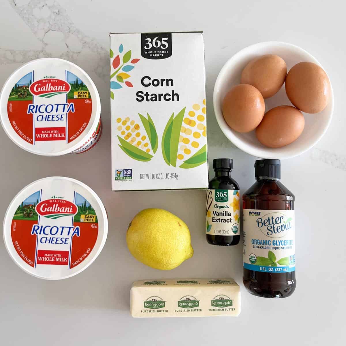 The ingredients needed to bake a ricotta cheesecake.