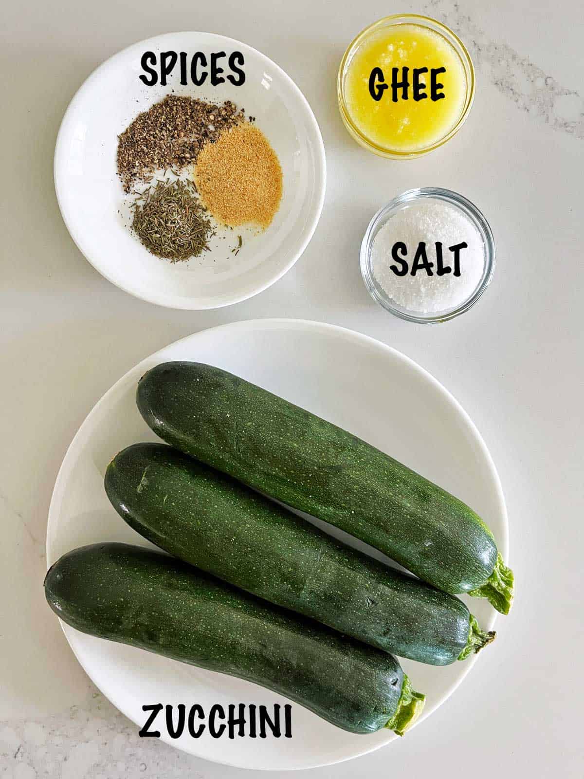 The ingredients needed to make roasted zucchini.