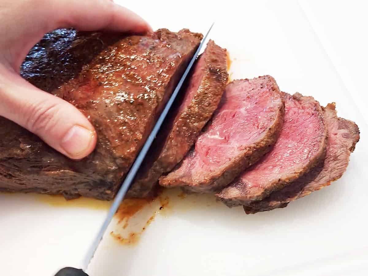 Slicing a flat iron steak.