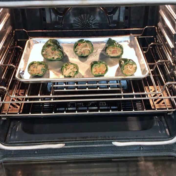 Placing the pan in the oven.