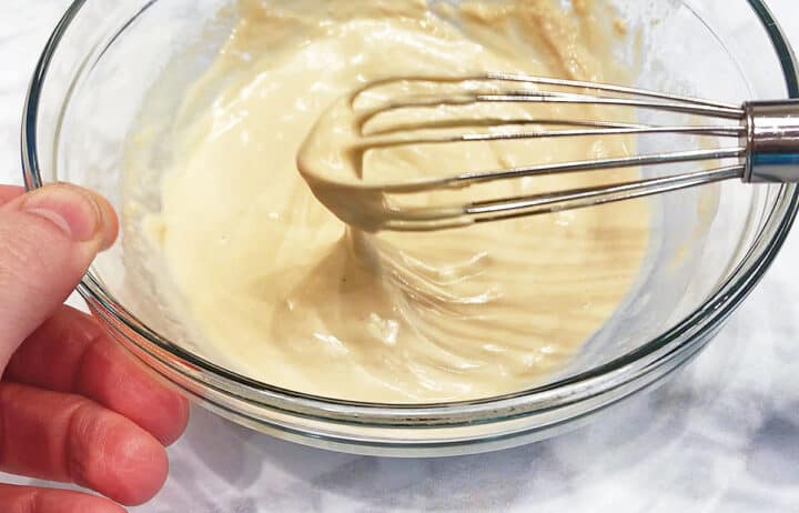 The recommended consistency of the tahini sauce.