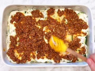 Layering the lasagna.