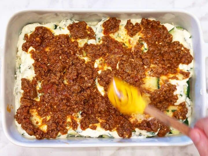 Layering the lasagna.