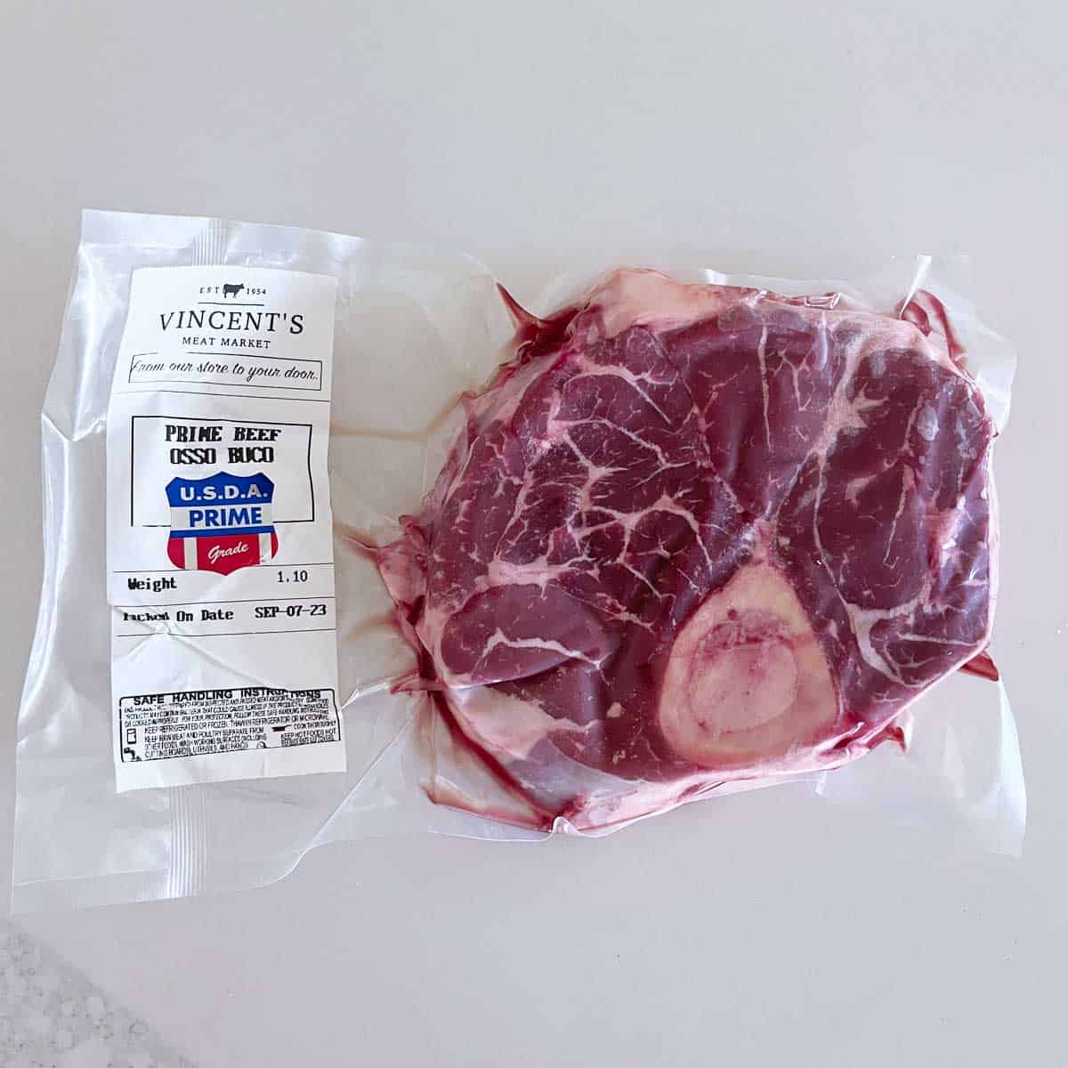 A beef shank in its package.