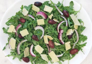 Top the salad with shaved parmesan.