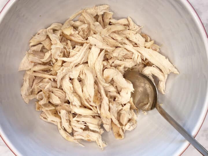 Shredded chicken in a bowl.