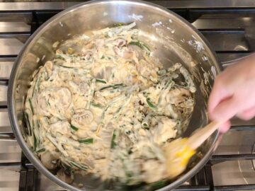 Mixing the casserole ingredients in the skillet.