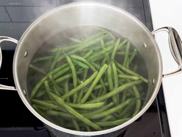 Boiling the green beans.