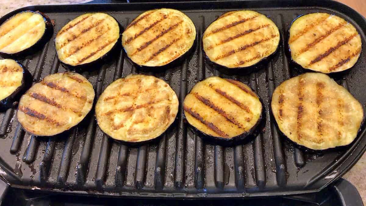 Second side of eggplant slices is grilled.