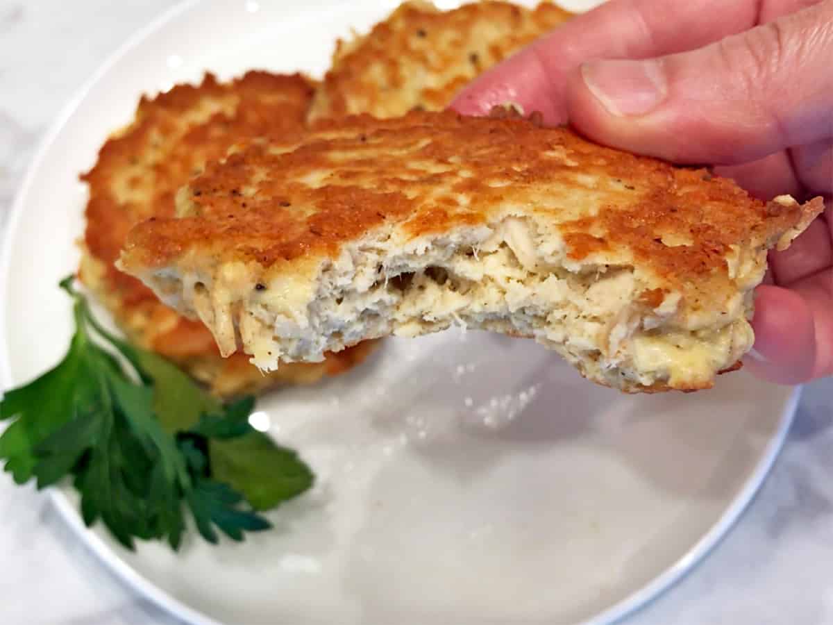 A bitten chicken patty.