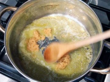 Cooking garlic in butter.