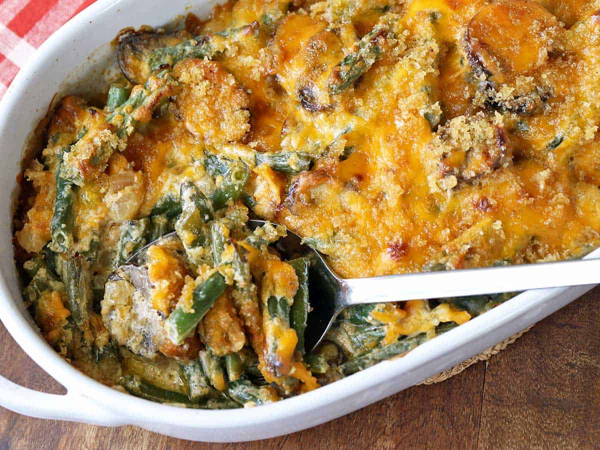 This casserole has cut green beans, mushrooms, and lots of cheese.