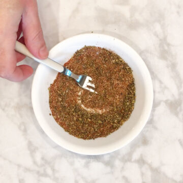 Mixing the spices for roasted pork tenderloin.