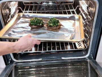 Returning the mushrooms to the oven.