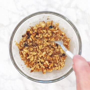 Mixing the coating in a bowl.