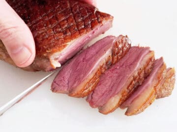 Slicing the duck breast.