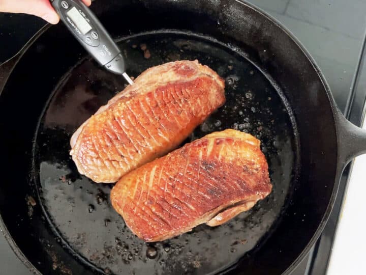 Checking the duck's internal temperature.