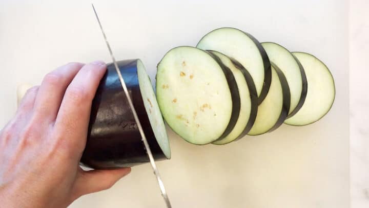 Slicing an eggplant.