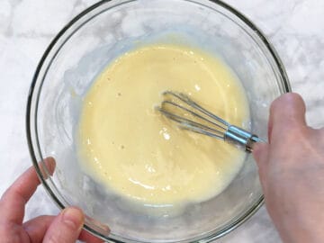 Whisking until smooth.