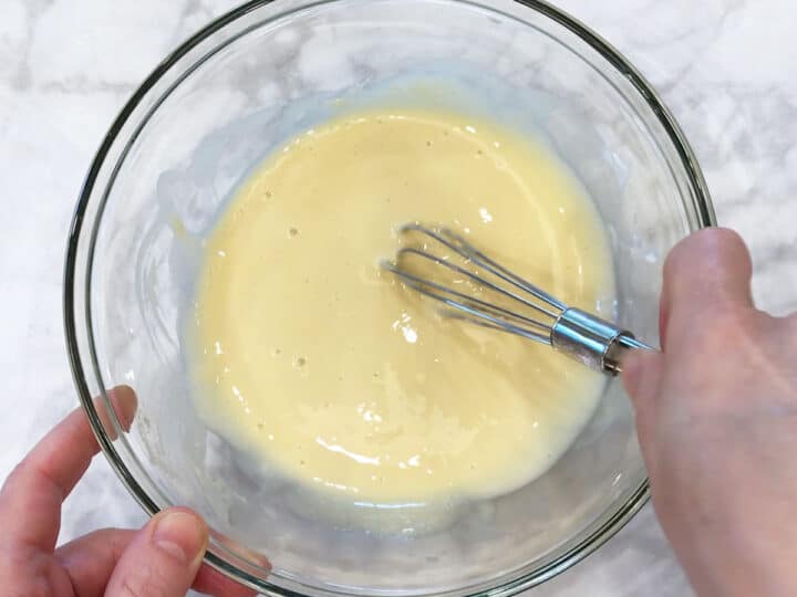 Whisking until smooth.