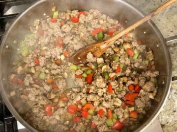 The sausage is cooked in the skillet.