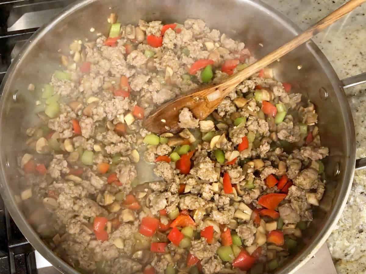 The sausage is cooked in the skillet.