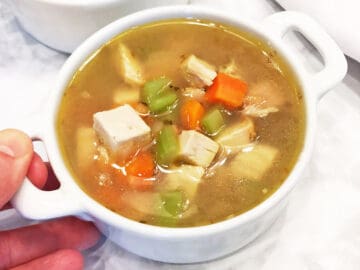 Turkey carcass soup is served.