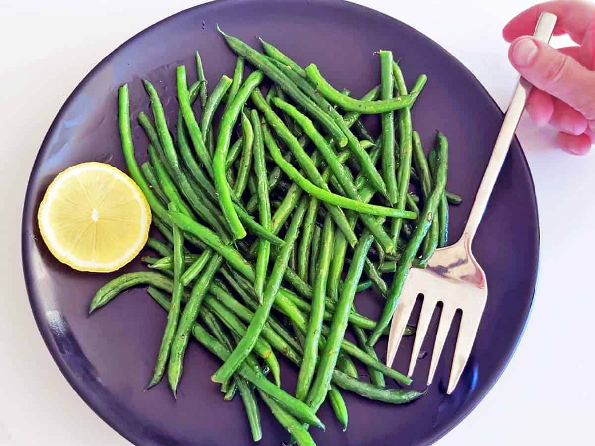 Haricot verts are served.
