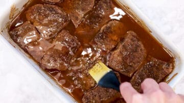Basting the short ribs.