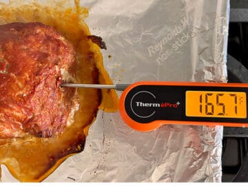 The meatloaf has reached an internal temperature of 165*F.