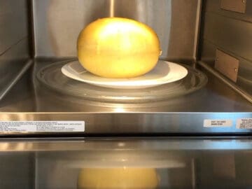 Microwaving a spaghetti squash.