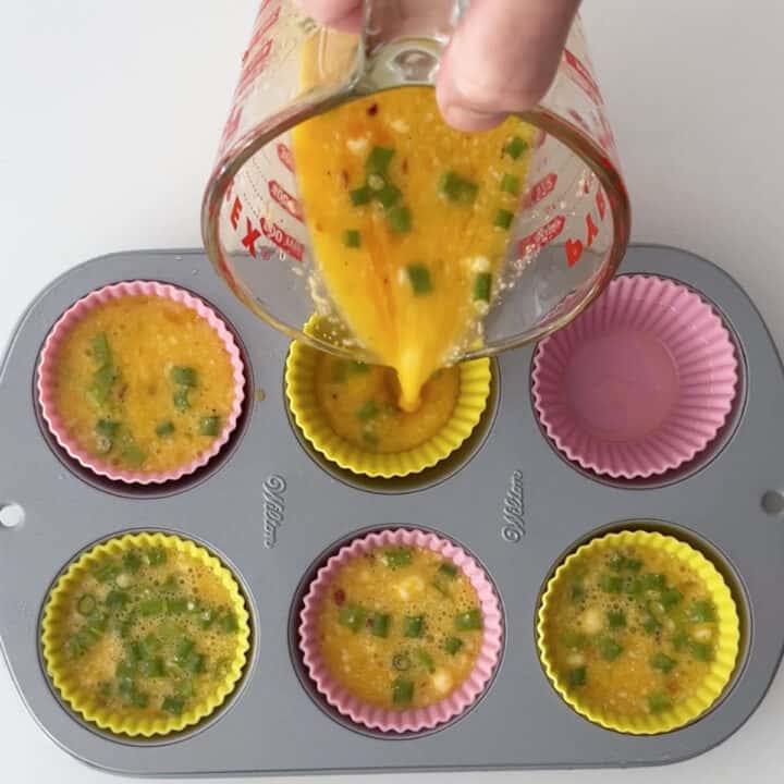 Pouring the egg mixture into the pan.