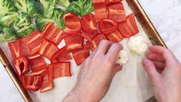 Arranging the vegetables on the pan.