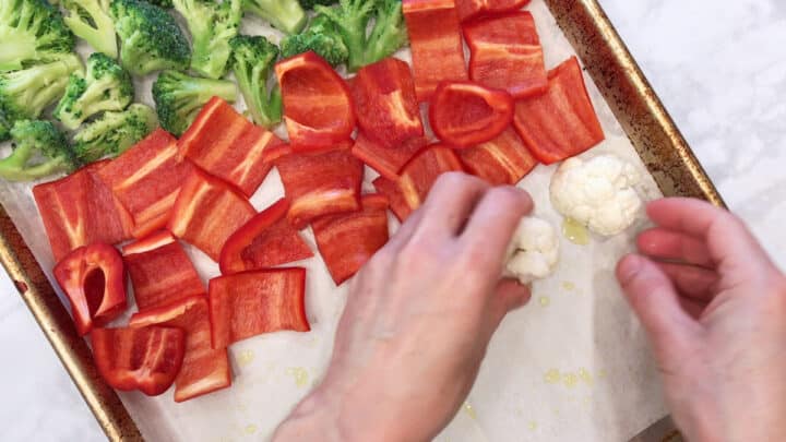 Arranging the vegetables on the pan.