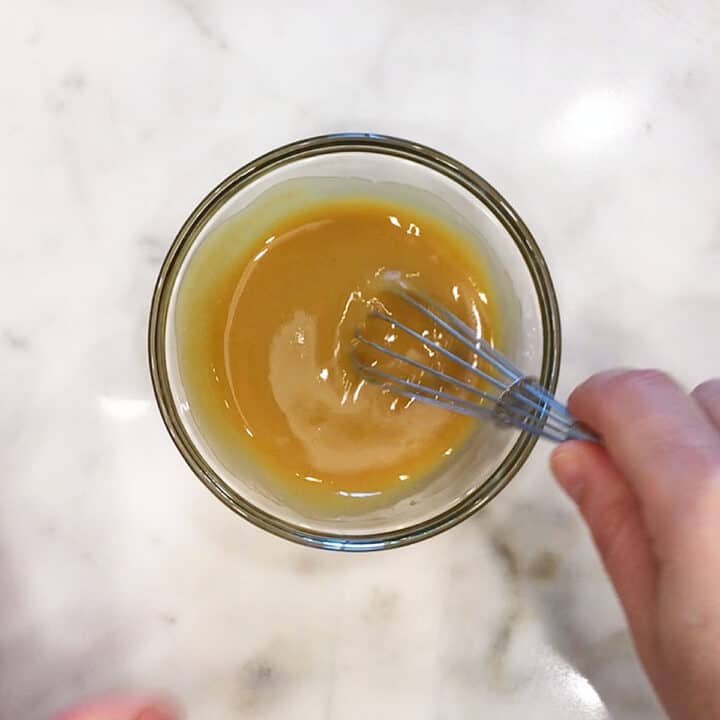 Mixing the glaze in a small bowl.